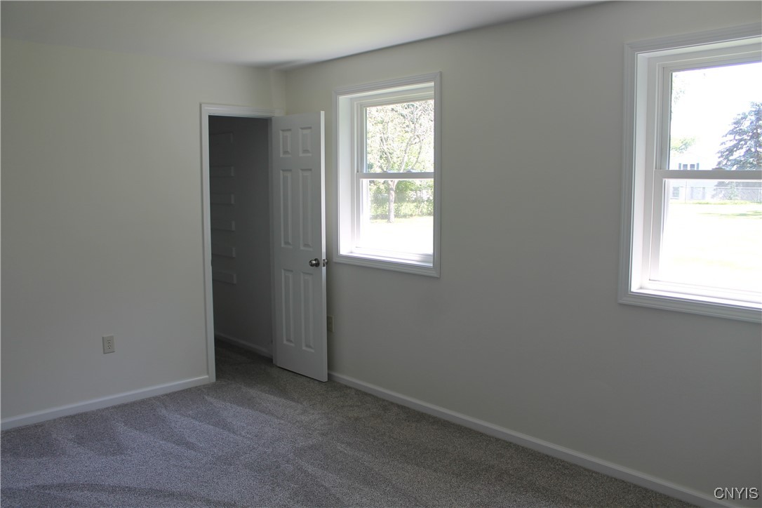 111 Willowcrest Drive Elbridge, NY 13060 - Photo 19 of 44 Living/Potential 4th bedroom/main floor Primary