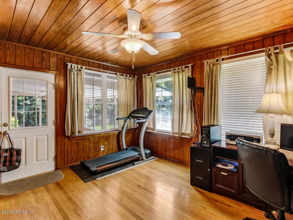 1526 Somerville Road Jacksonville, FL 32207 - Photo 11 of 30 a living room with furniture windows and a flat screen tv