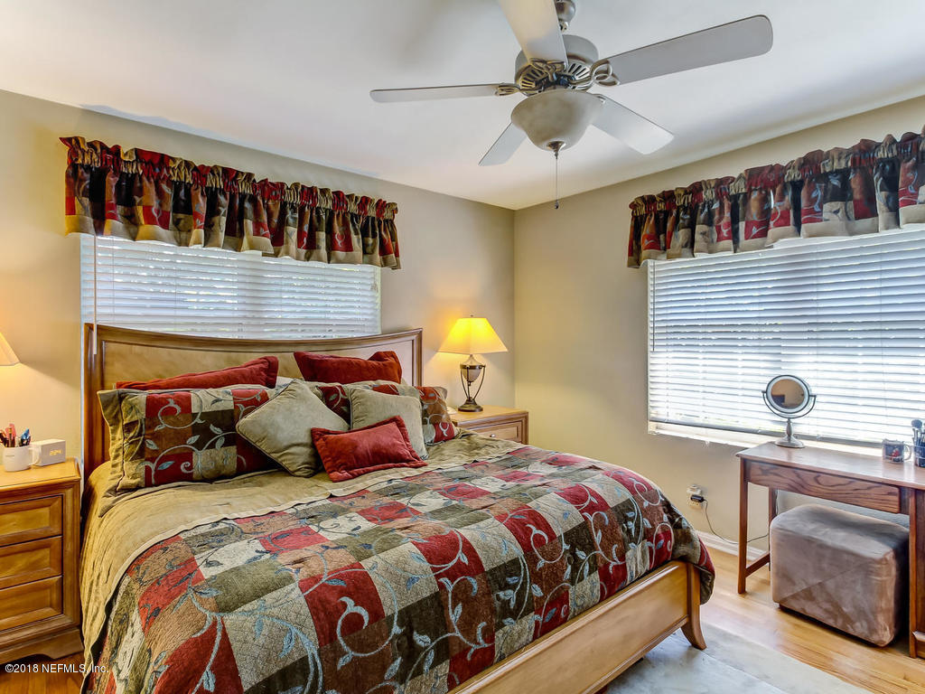 1526 Somerville Road Jacksonville, FL 32207 - Photo 20 of 30 a bedroom with a bed and a window