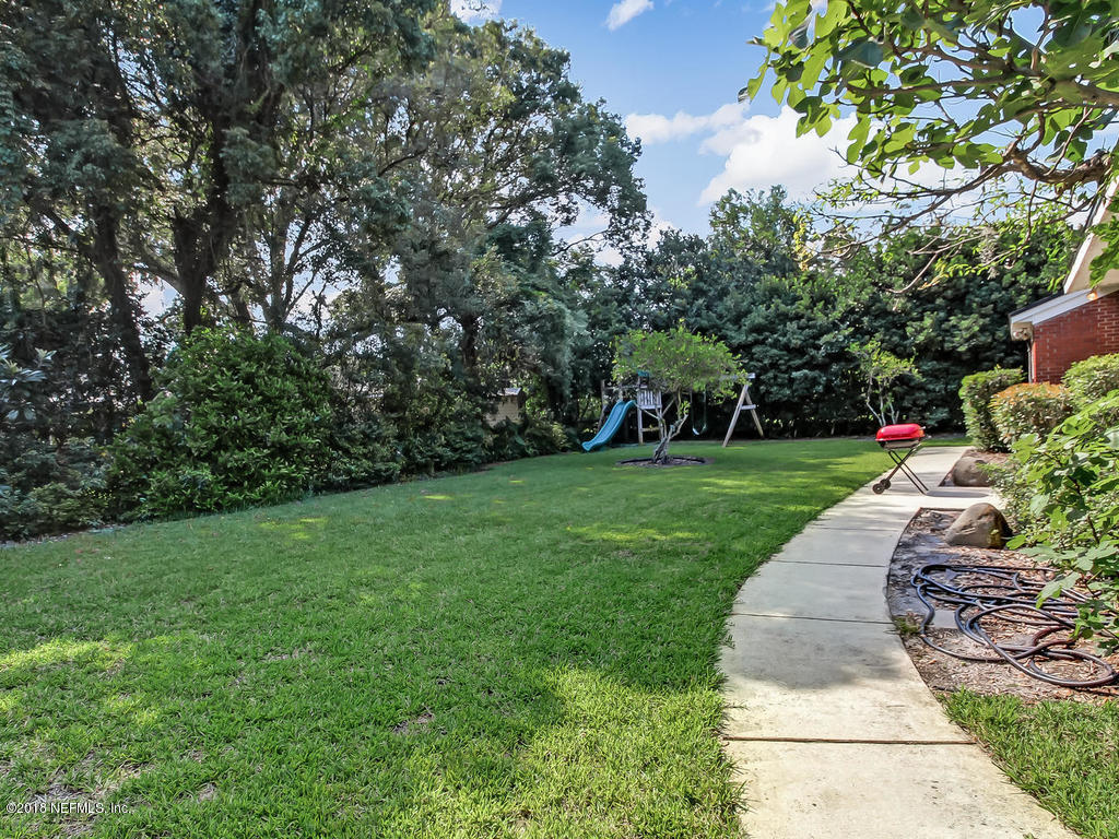 1526 Somerville Road Jacksonville, FL 32207 - Photo 28 of 30 a view of a garden with a slide