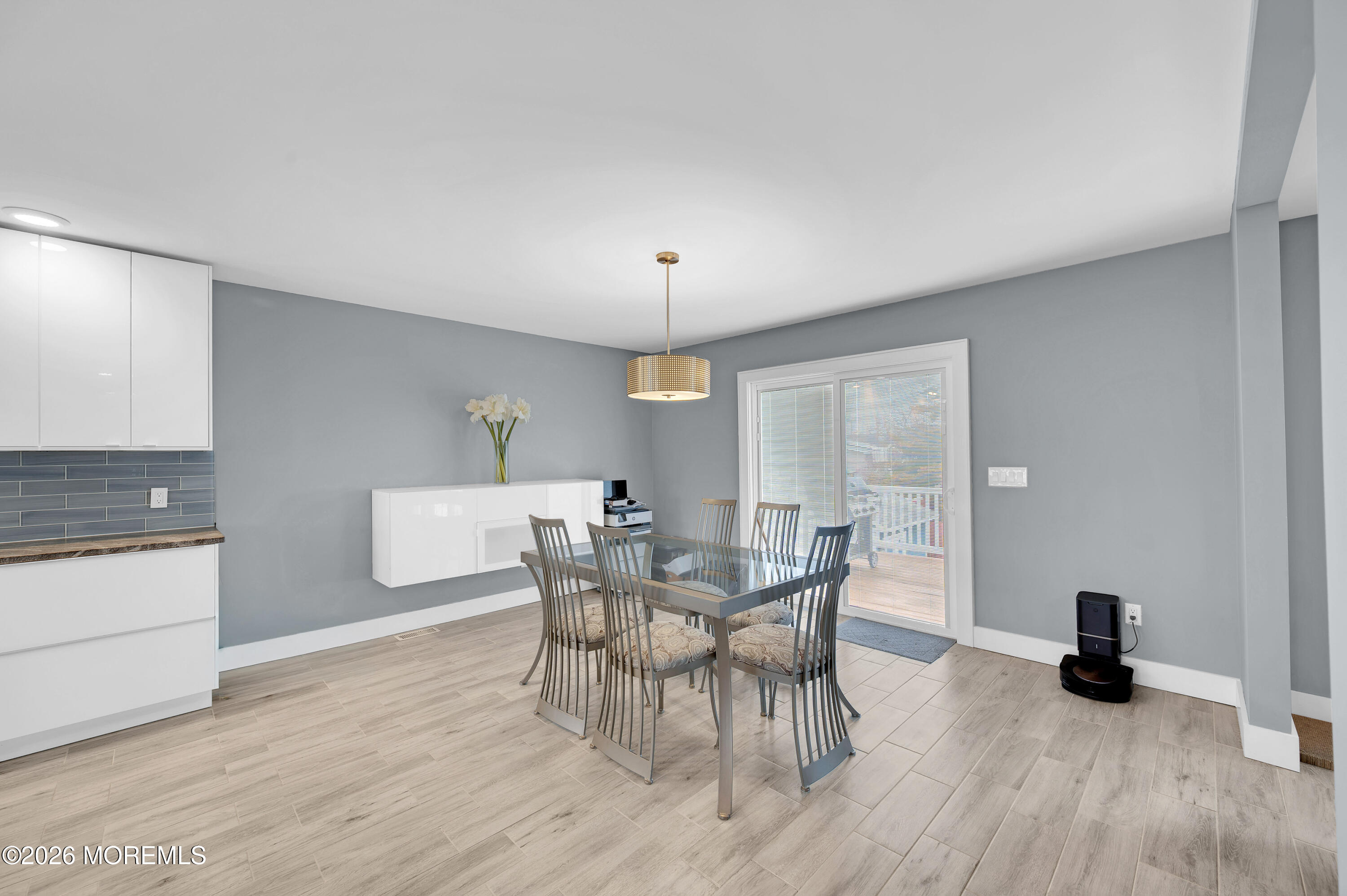 97 Bay View Drive Brick, NJ 08723 - Photo 25 of 65 a view of a dining room with furniture and wooden floor