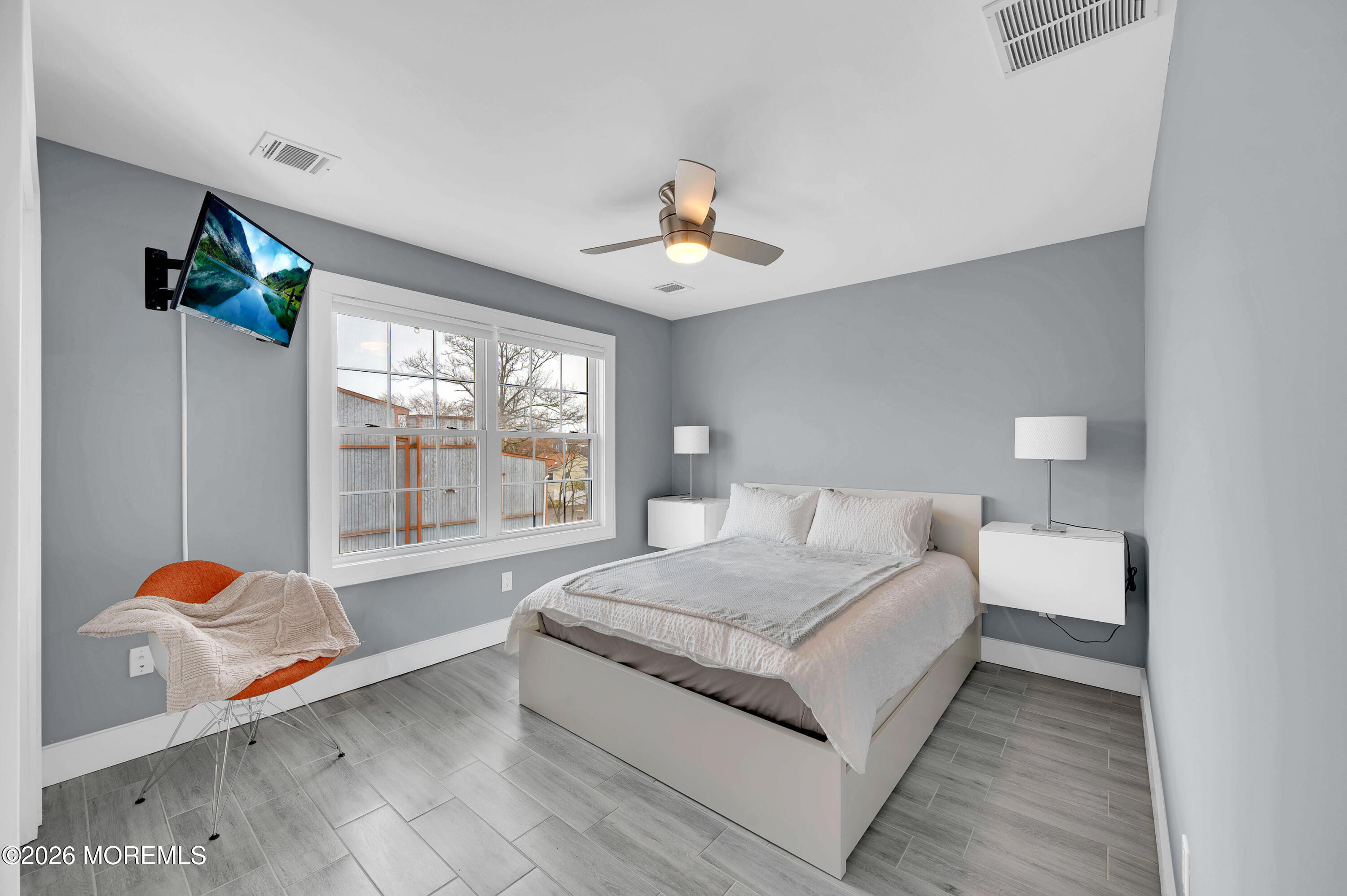 97 Bay View Drive Brick, NJ 08723 - Photo 38 of 65 a living room with furniture and a chandelier