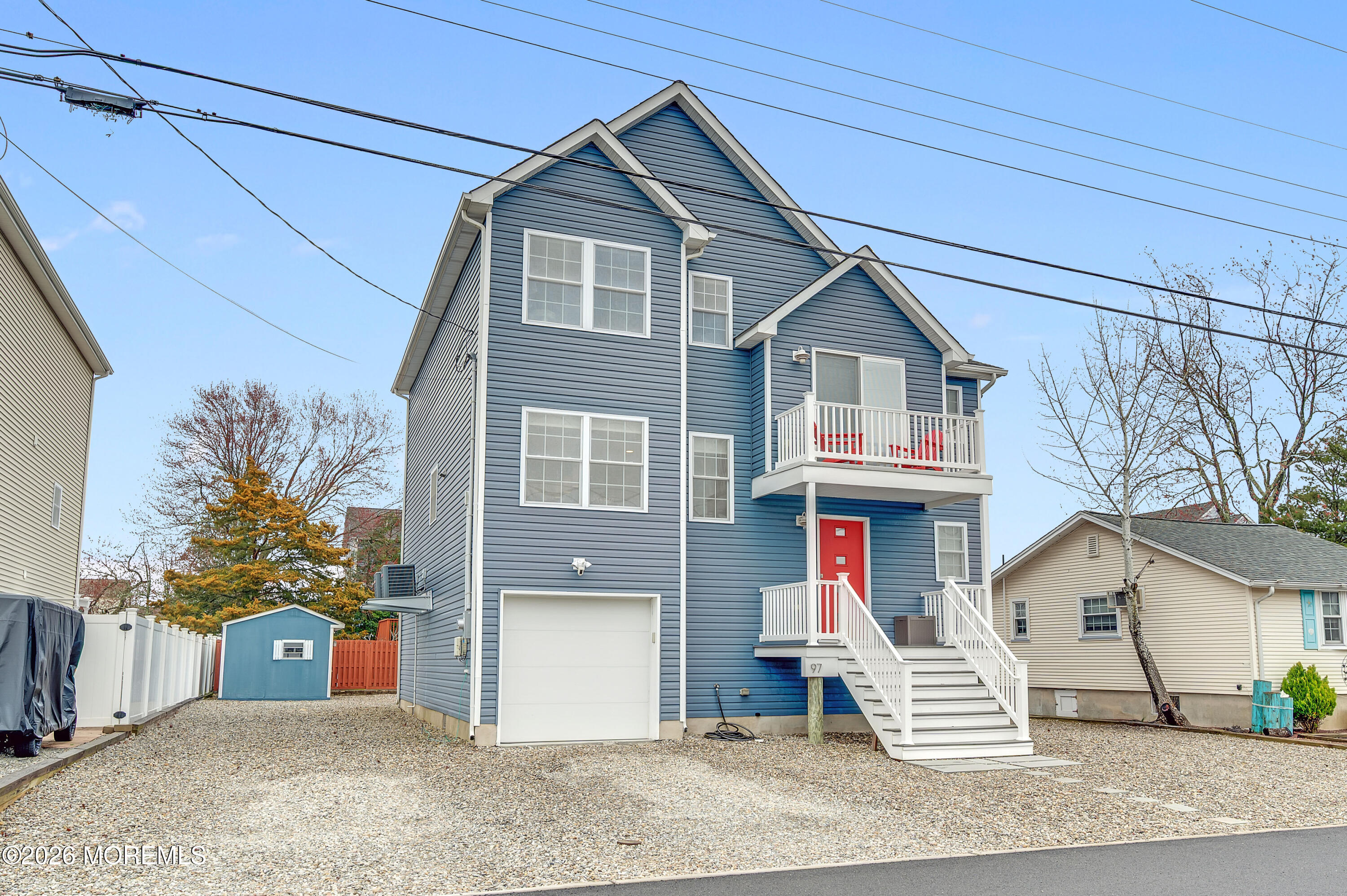 97 Bay View Drive Brick, NJ 08723 - Photo 4 of 65 a front view of a house with garden