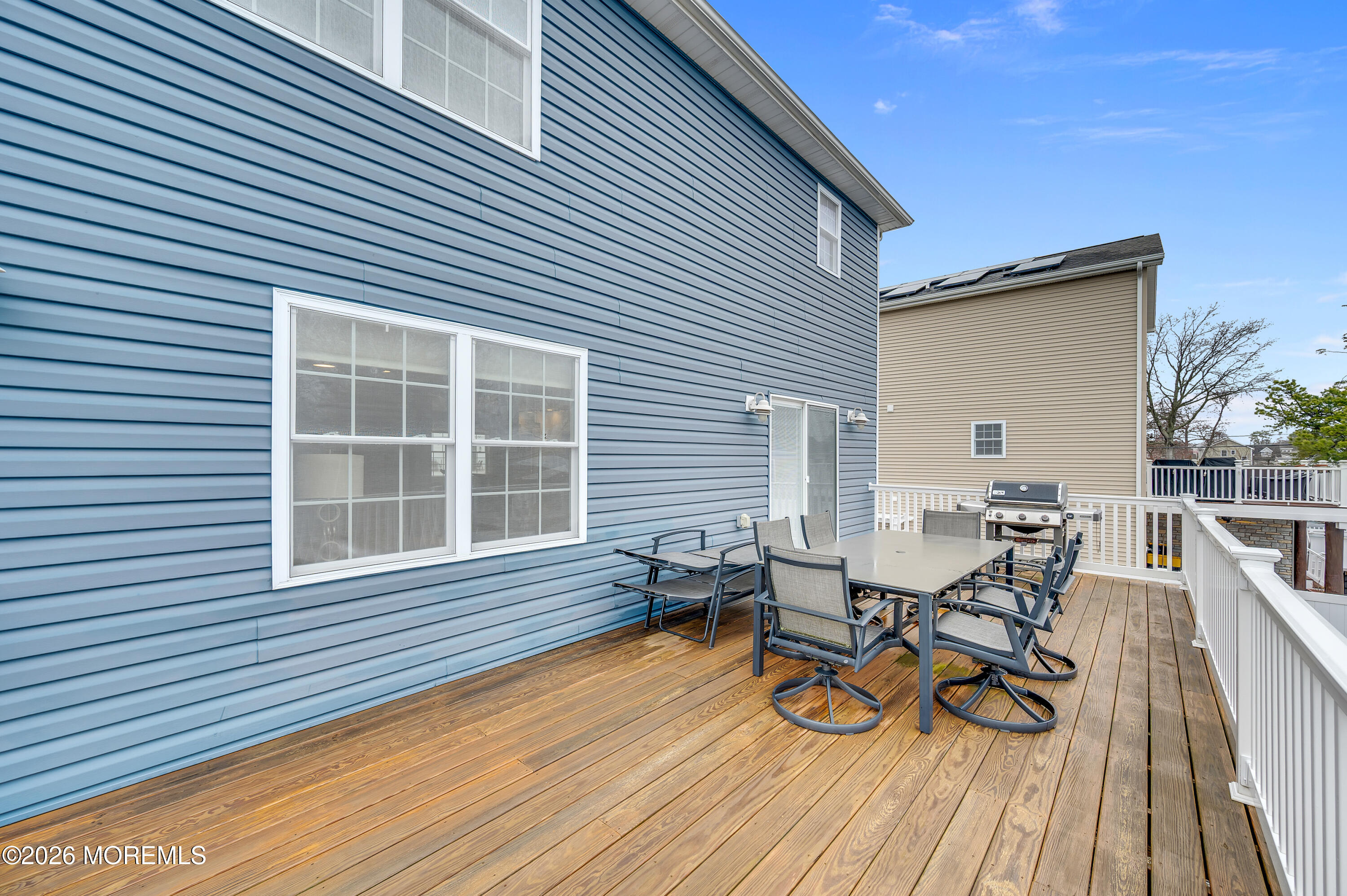 97 Bay View Drive Brick, NJ 08723 - Photo 44 of 65 a view of a house with sitting area and wooden floor