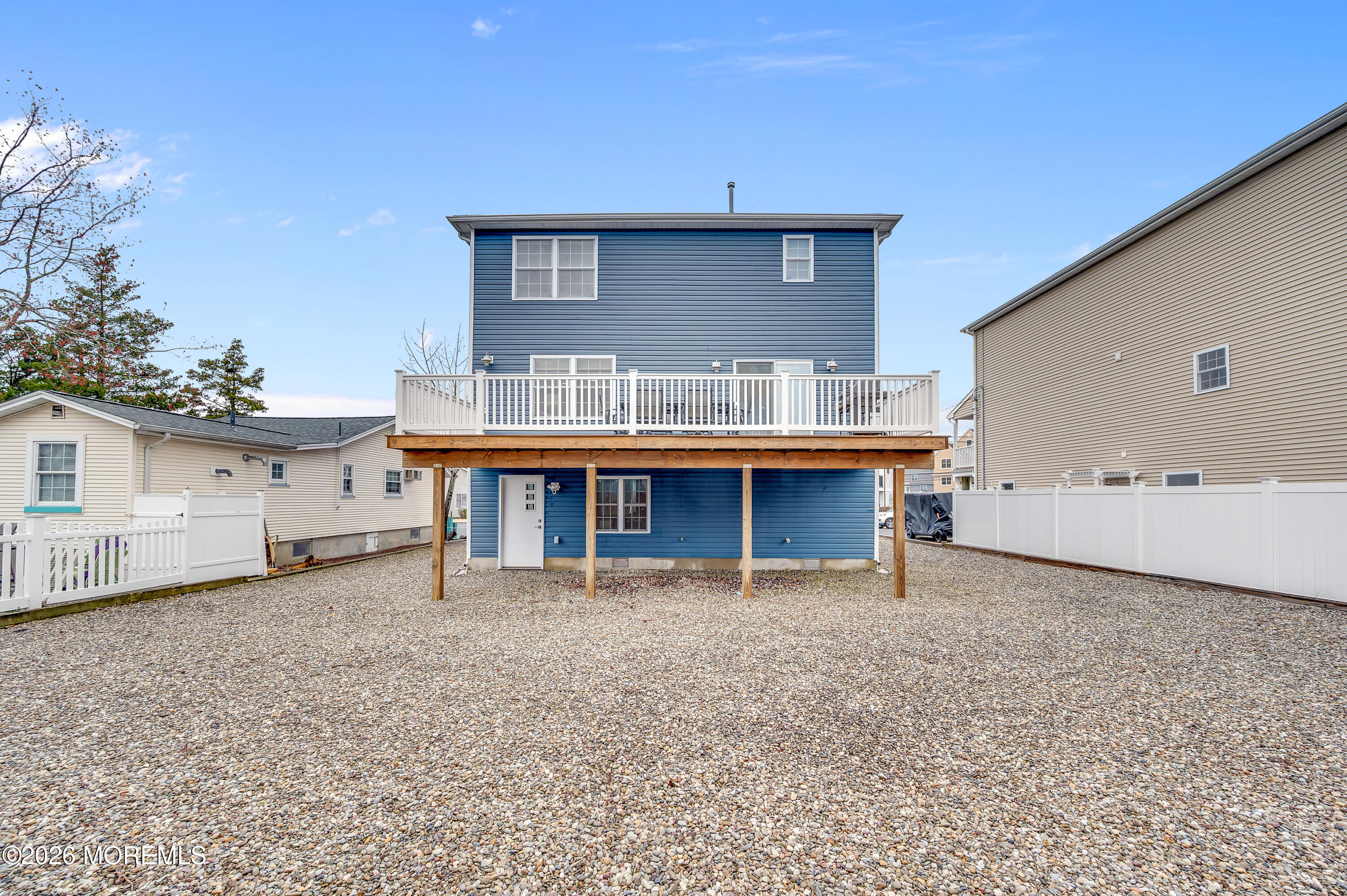 97 Bay View Drive Brick, NJ 08723 - Photo 46 of 65 a view of a house with a backyard and a tree