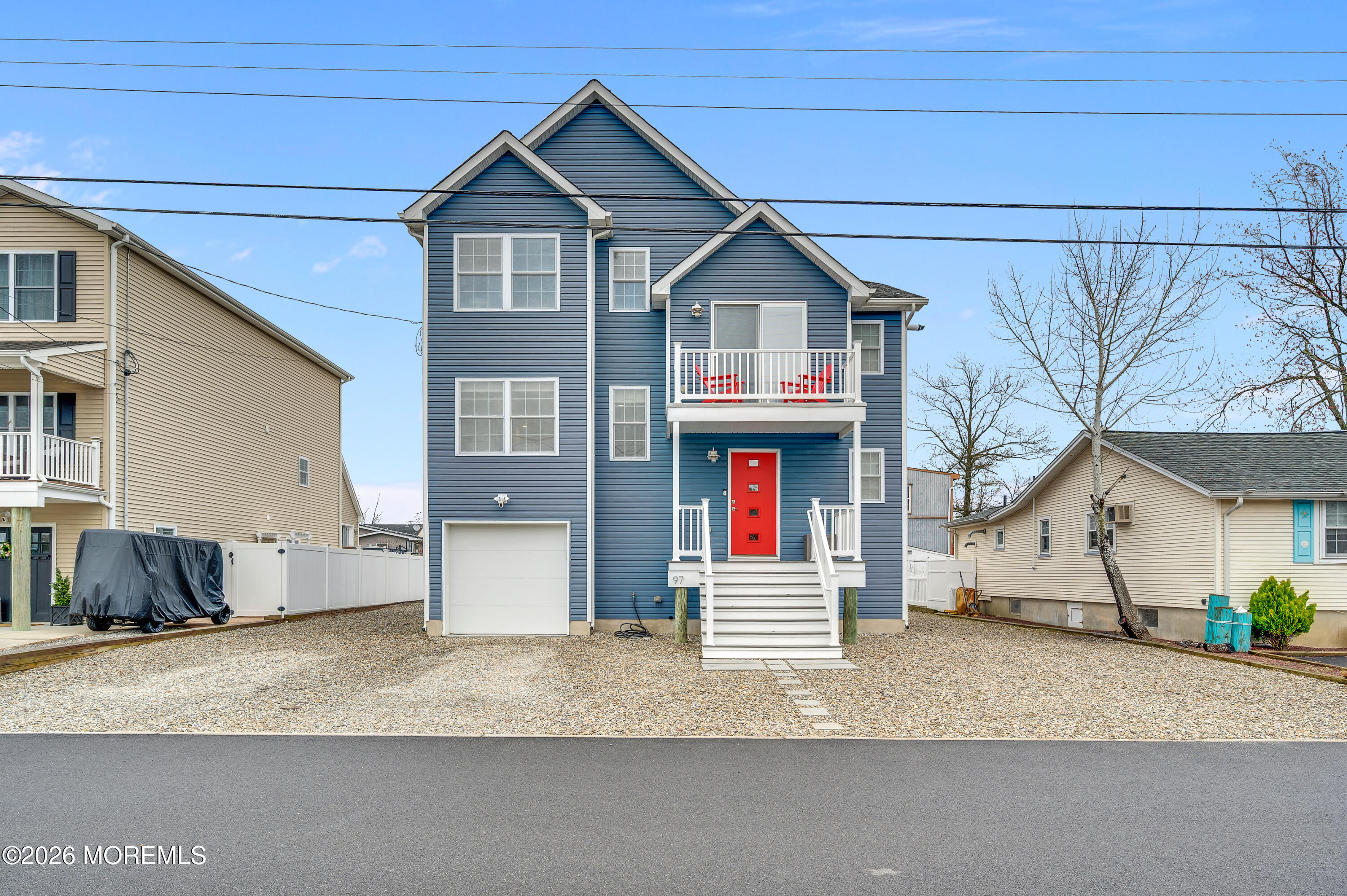 97 Bay View Drive Brick, NJ 08723 - Photo 5 of 65 a front view of a house with a garage
