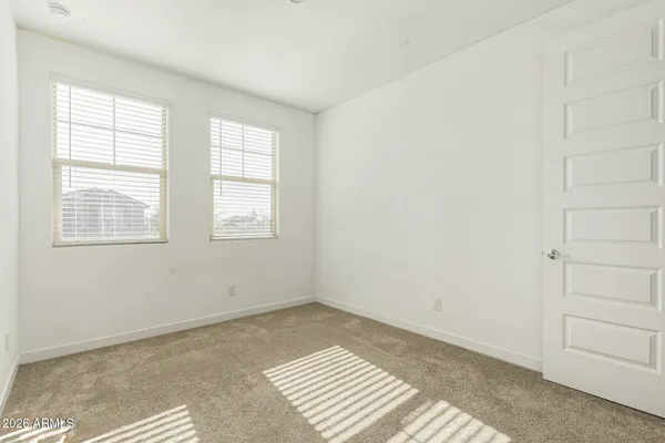 a view of an empty room and window