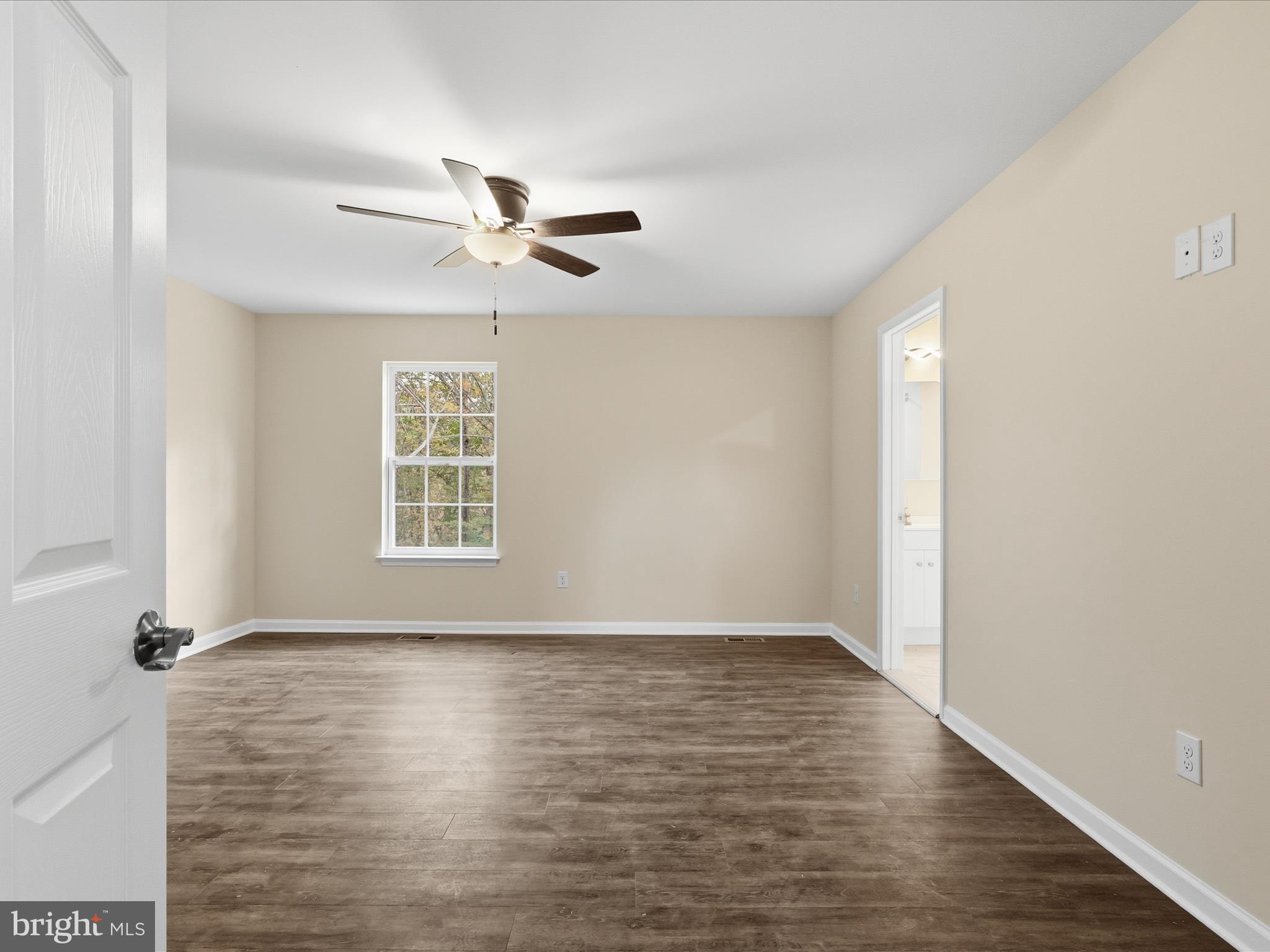 3281 Russel Run Road Locust Grove, VA 22508 - Photo 27 of 78 wooden floor in an empty room with a window
