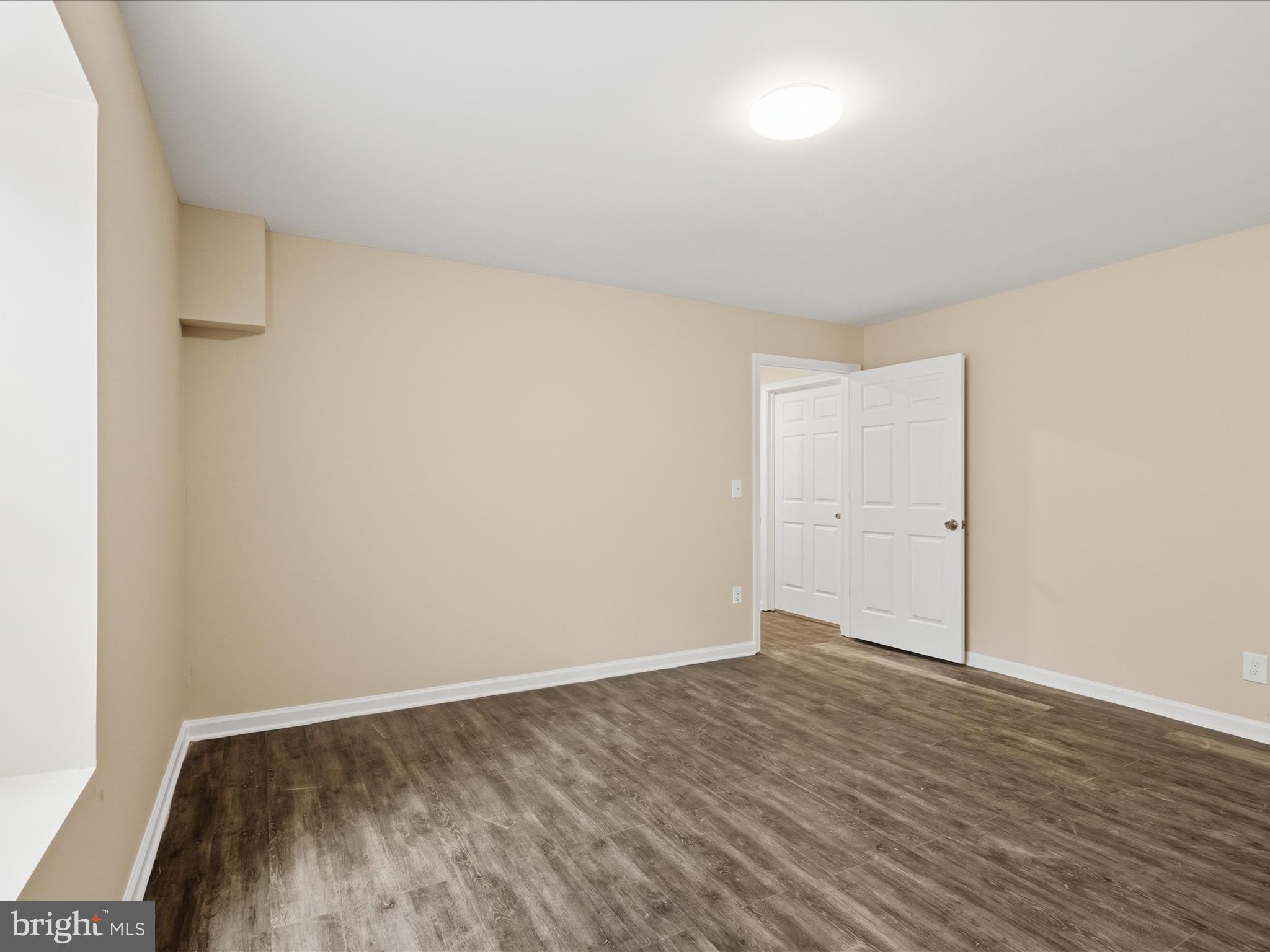 3281 Russel Run Road Locust Grove, VA 22508 - Photo 41 of 78 a view of an empty room and wooden floor