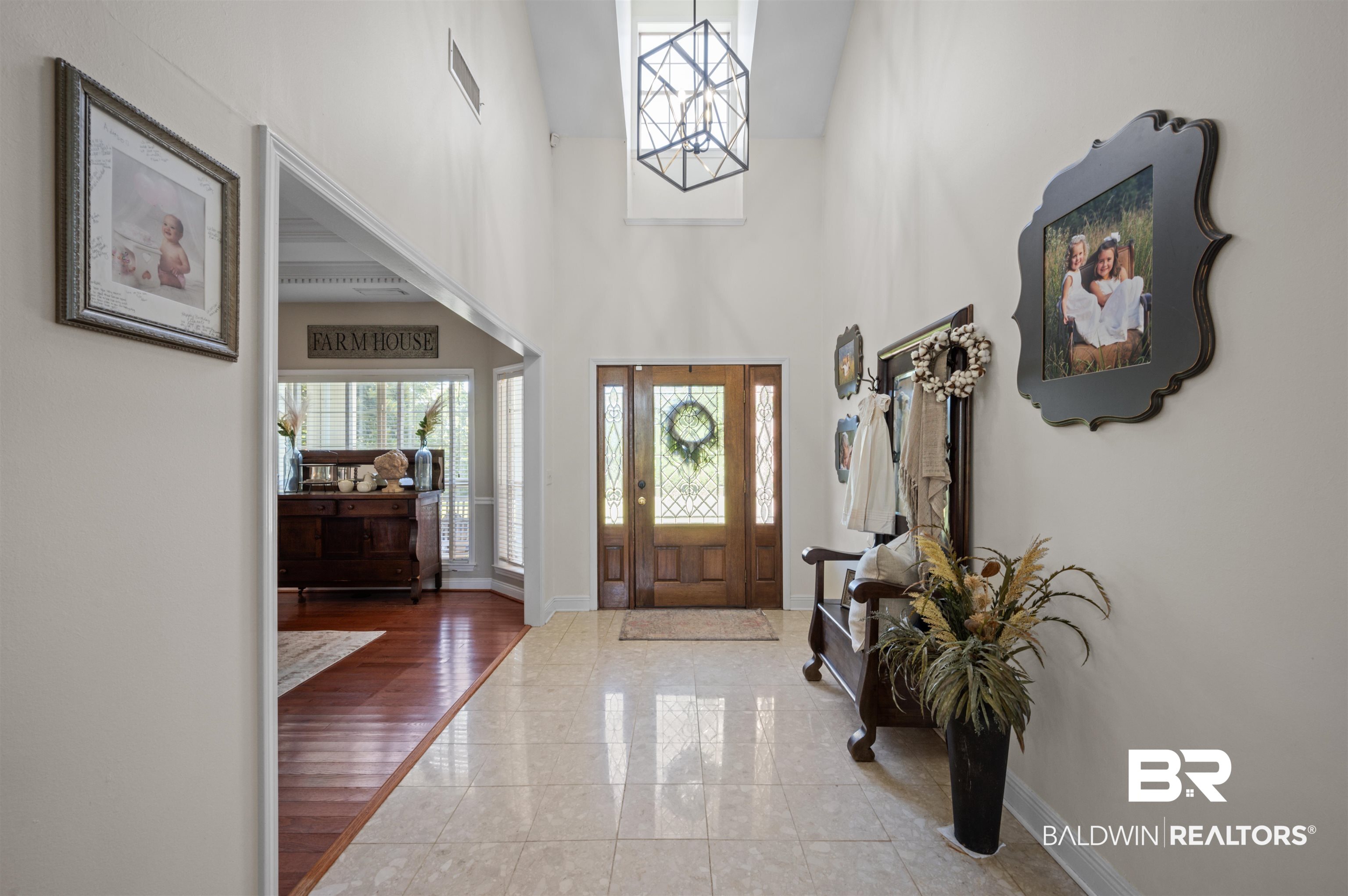 141 Blue Ridge Drive Monroeville, AL 36460 - Photo 2 of 40 Entrance foyer featuring a chandelier and a towering ceiling