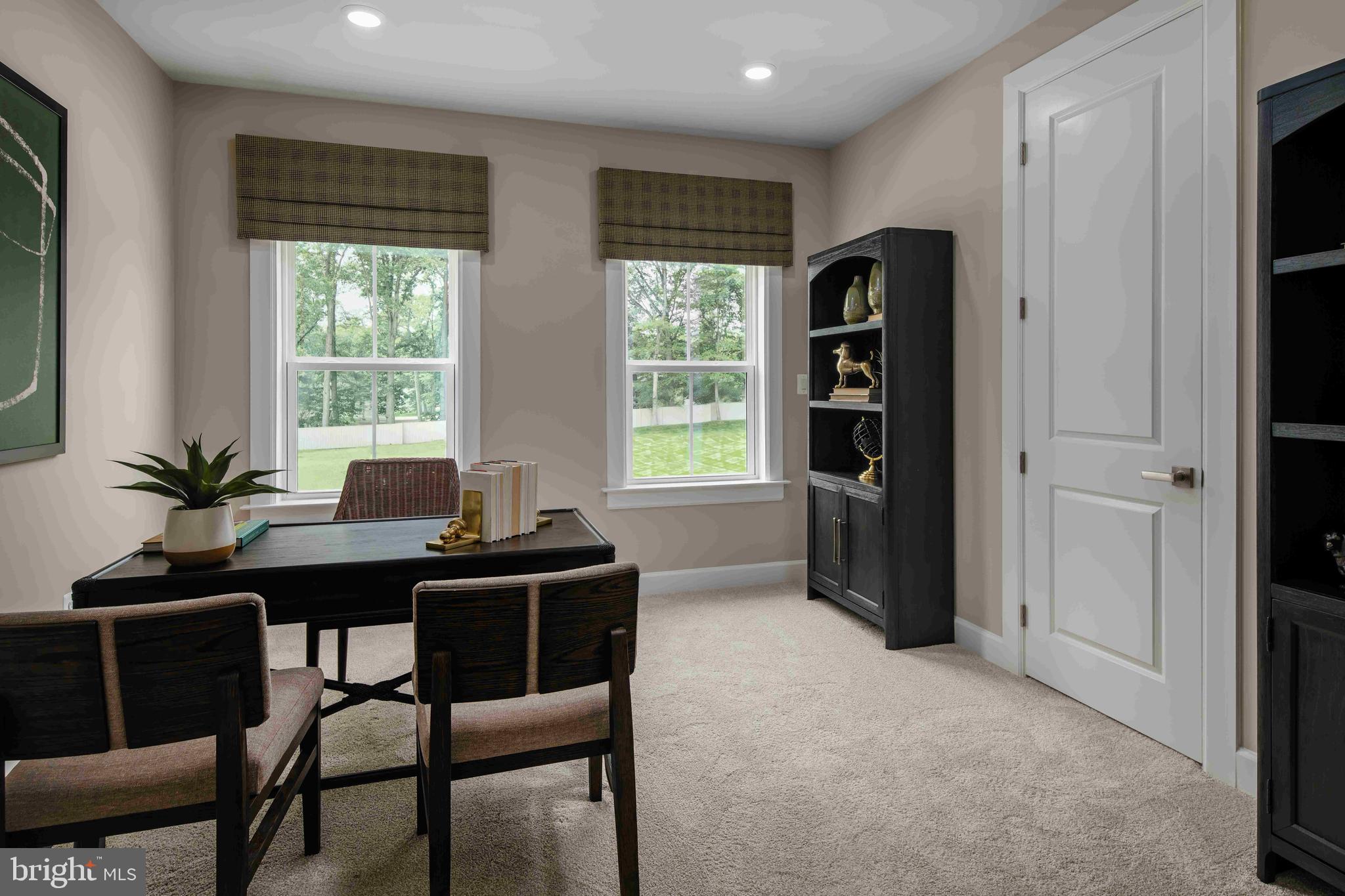5446 Pondview Lane Ellicott City, MD 21043 - Photo 12 of 21 a view of a workspace with a window and dining table chair