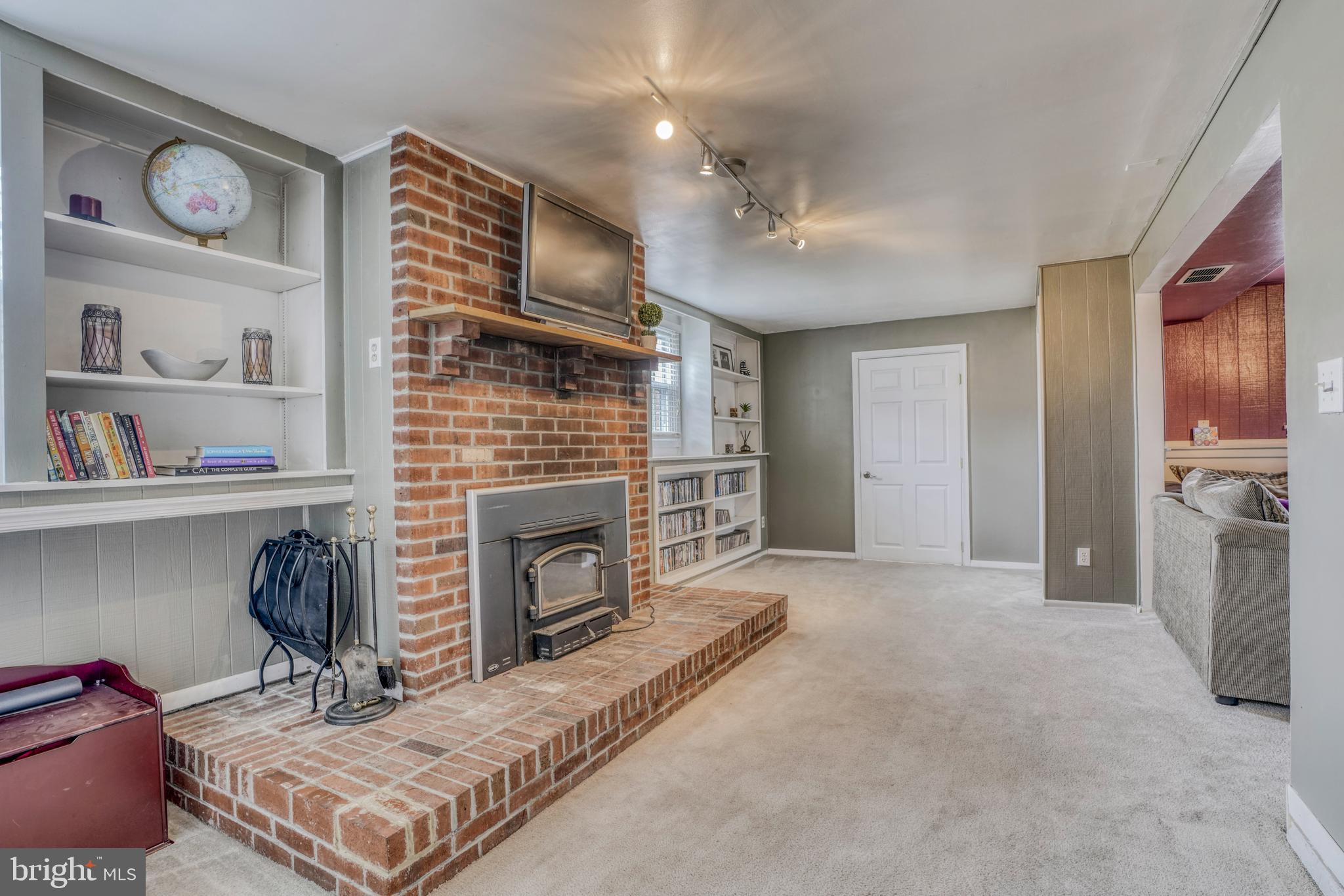 2 Ridgefield Road Lutherville-Timonium, MD 21093 - Photo 28 of 38 Bonus room in basement 2/ fireplace