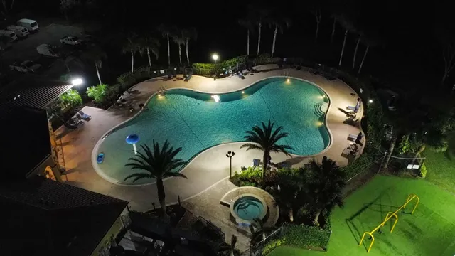 an aerial view of a swimming pool
