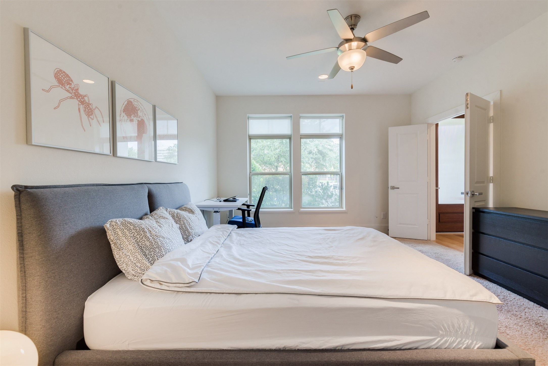 5429 Hidalgo Street, Unit B Houston, TX 77056 - Photo 35 of 38 a large white bed in a white room