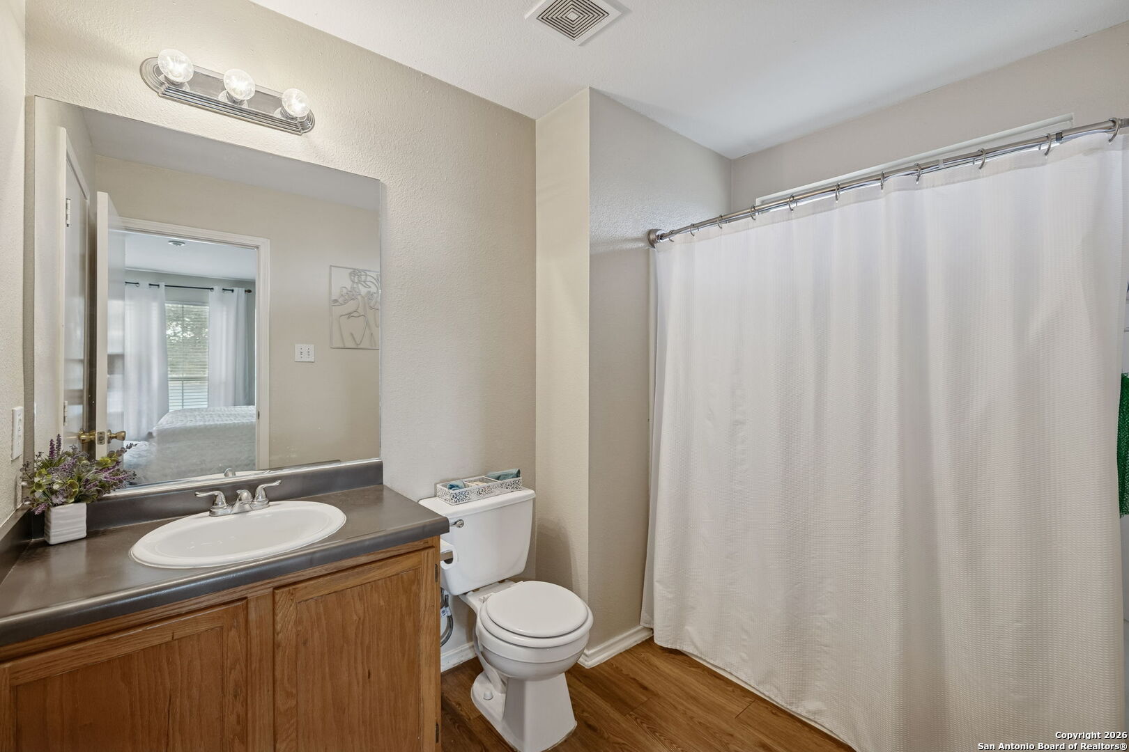 10310 Springwood Square Universal City, TX 78148 - Photo 24 of 44 a bathroom with a sink and a toilet