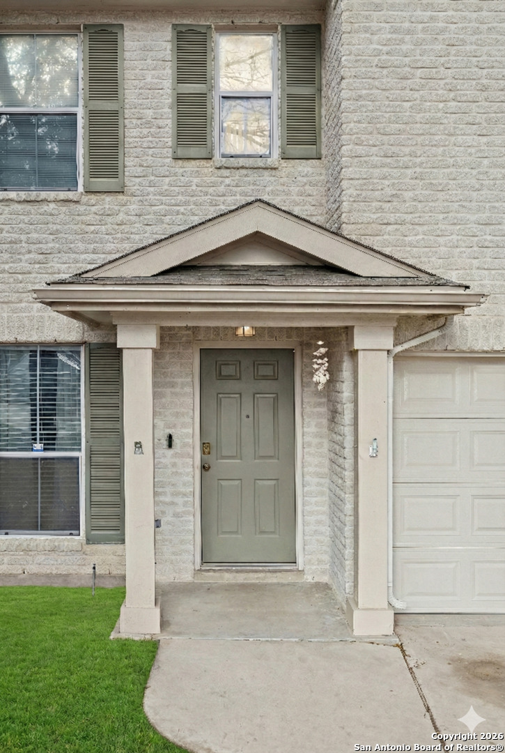 10310 Springwood Square Universal City, TX 78148 - Photo 4 of 44 front view of a house with a yard