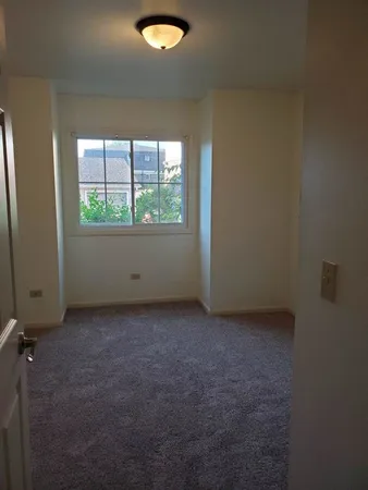 a view of a livingroom with a chandelier