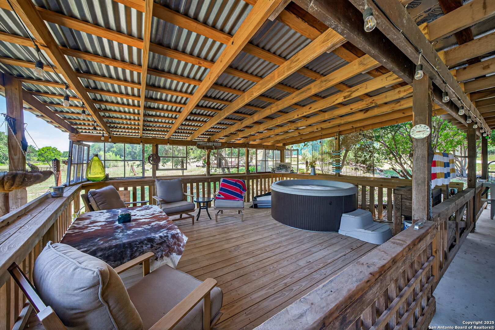 924 Wagon Creek Road Bandera, TX 78003 - Photo 15 of 33 a view of porch with seating space