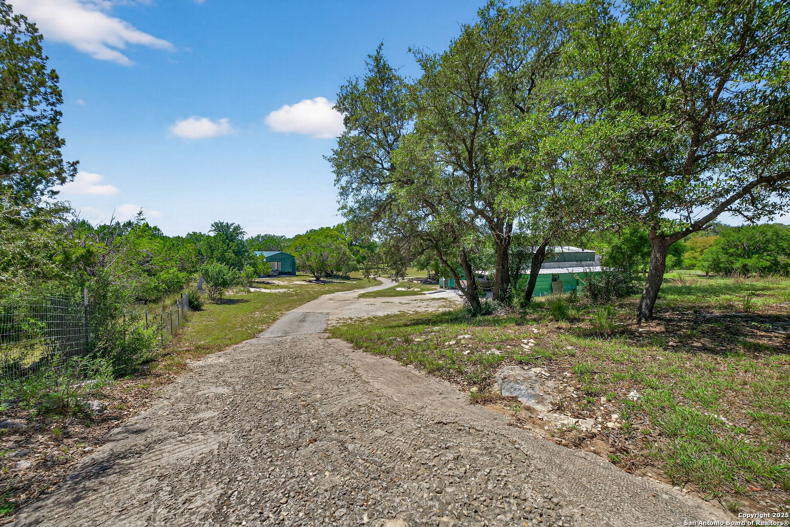 924 Wagon Creek Road Bandera, TX 78003 - Photo 2 of 33 a view of backyard with green space
