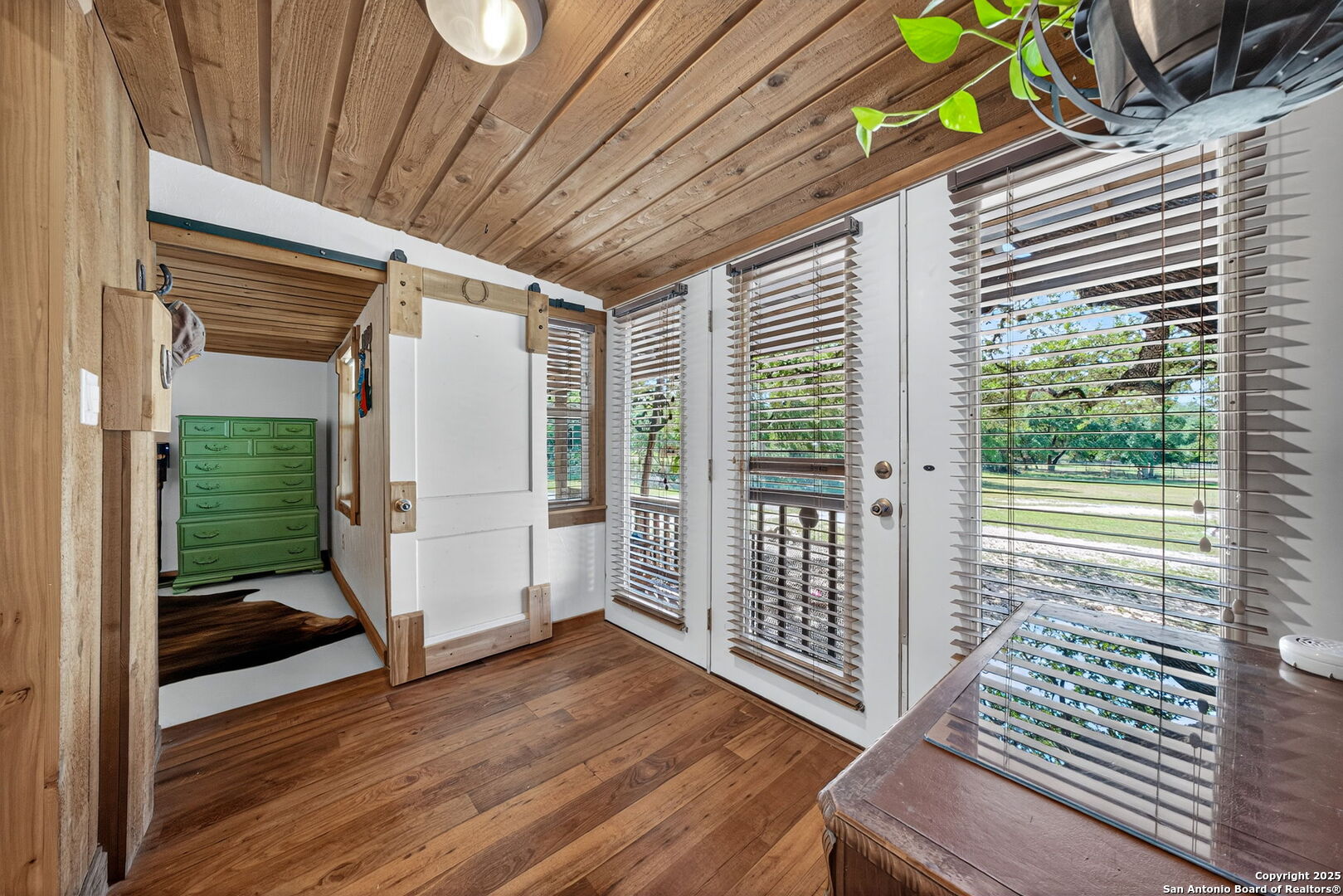 924 Wagon Creek Road Bandera, TX 78003 - Photo 6 of 33 a view of entryway with wooden floor