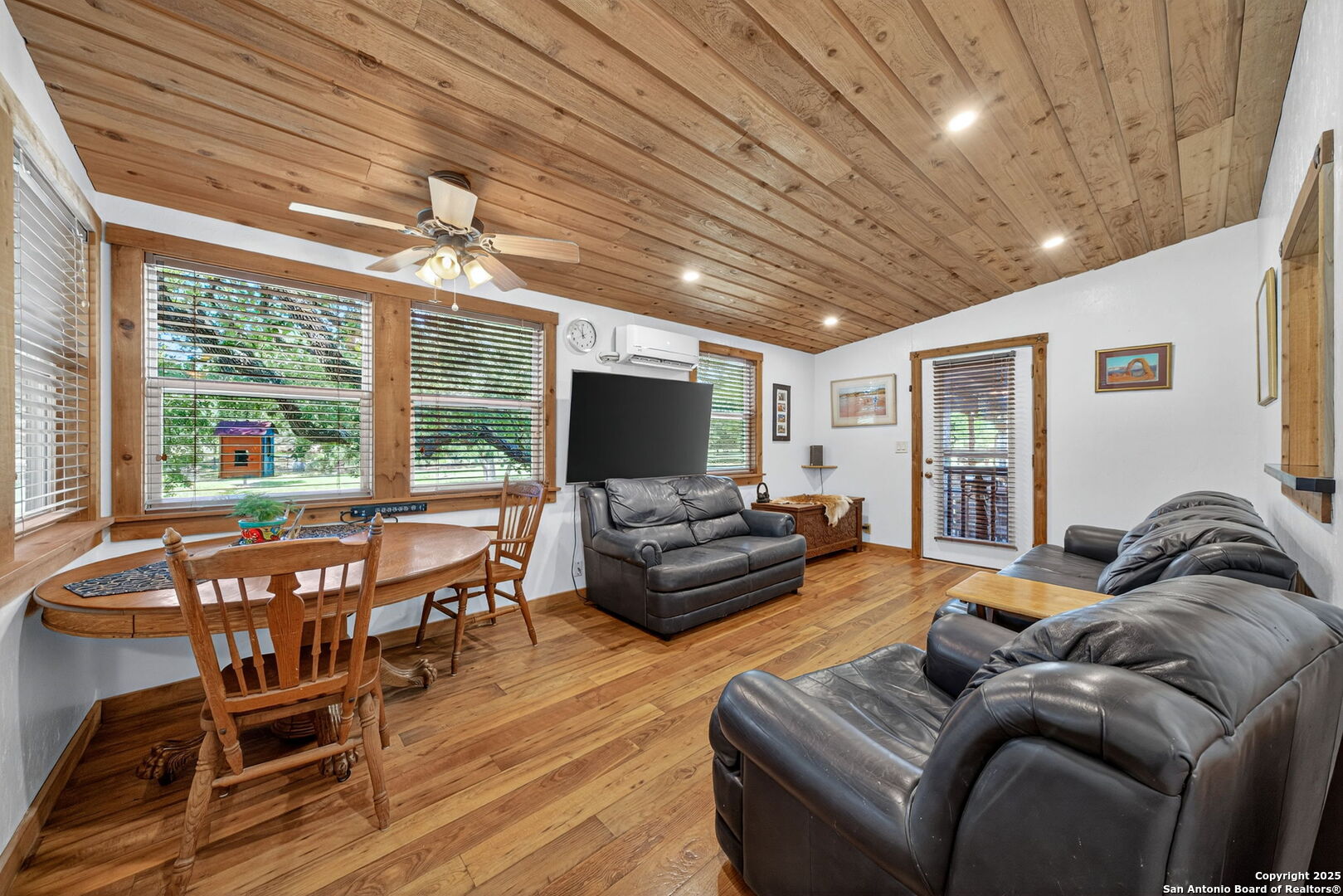 924 Wagon Creek Road Bandera, TX 78003 - Photo 7 of 33 a living room with furniture and a large window