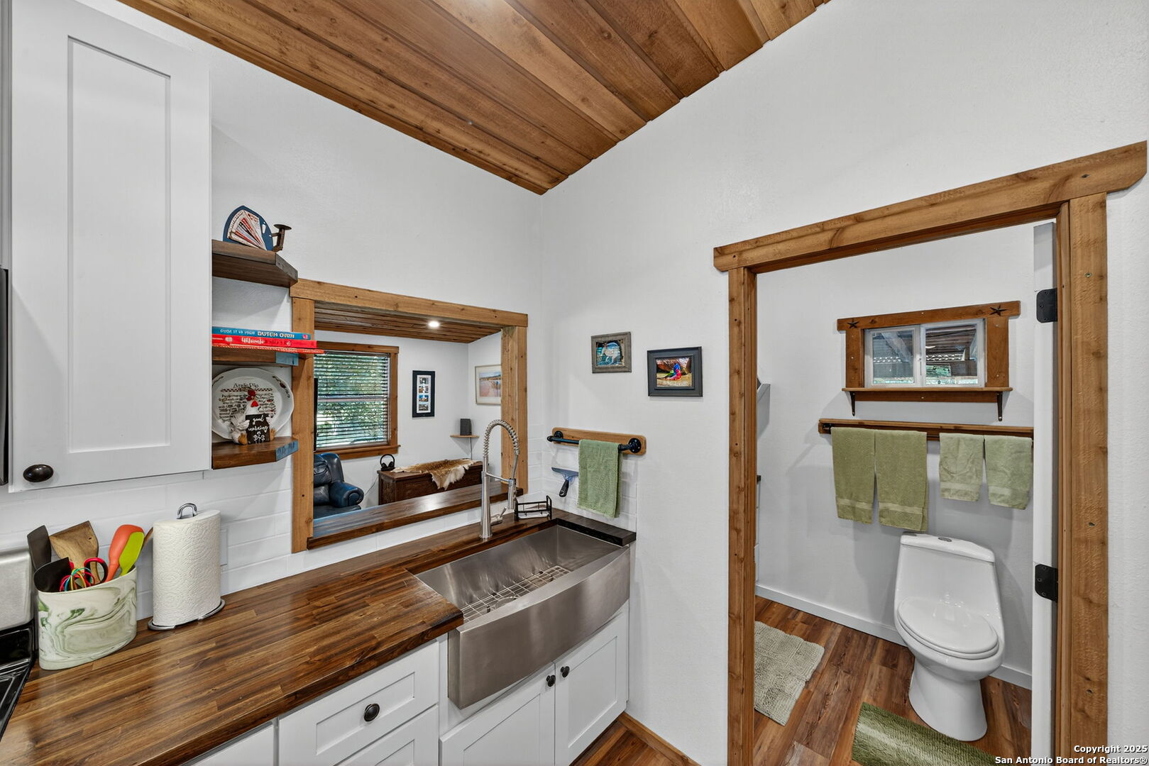 924 Wagon Creek Road Bandera, TX 78003 - Photo 10 of 33 a bathroom with a sink a toilet and shower