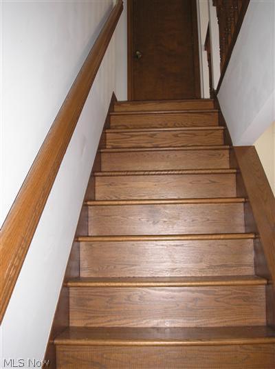 5710 Ridge Road Cortland, OH 44410 - Photo 20 of 23 Wood stairs to 2nd level