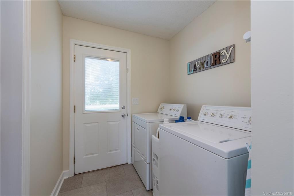 509 Baucom Deese Road, Unit 4 Monroe, NC 28110 - Photo 14 of 31 a utility room with dryer and washer