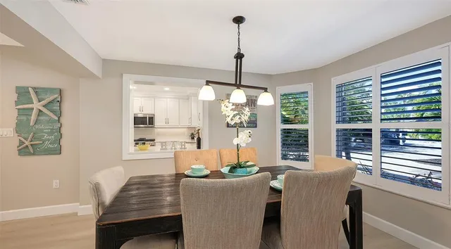 a kitchen with stainless steel appliances a refrigerator sink and stove