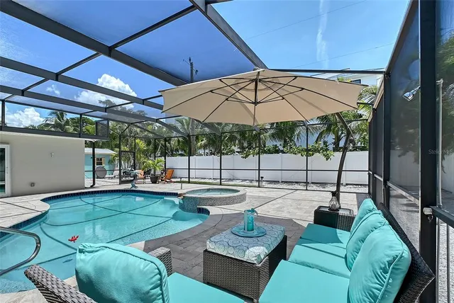 a view of a house with backyard