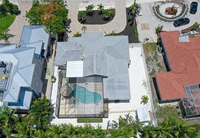 a view of a bedroom with baby bed and toys