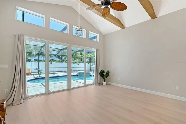 a view of a livingroom with furniture and a fireplace