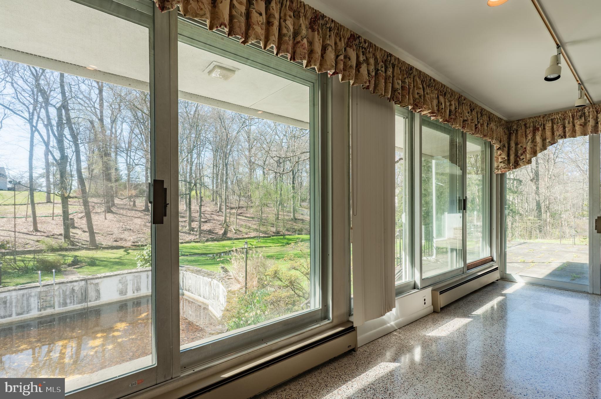 1211 East Butler Pike Ambler, PA 19002 - Photo 18 of 76 a view of a large window with an outdoor space
