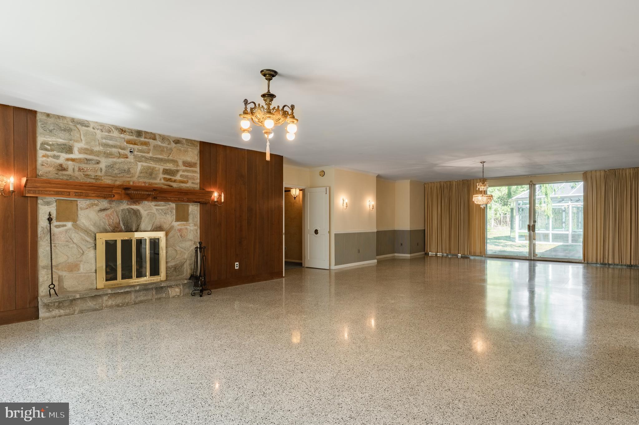 1211 East Butler Pike Ambler, PA 19002 - Photo 22 of 76 an empty room with windows and pillars in it