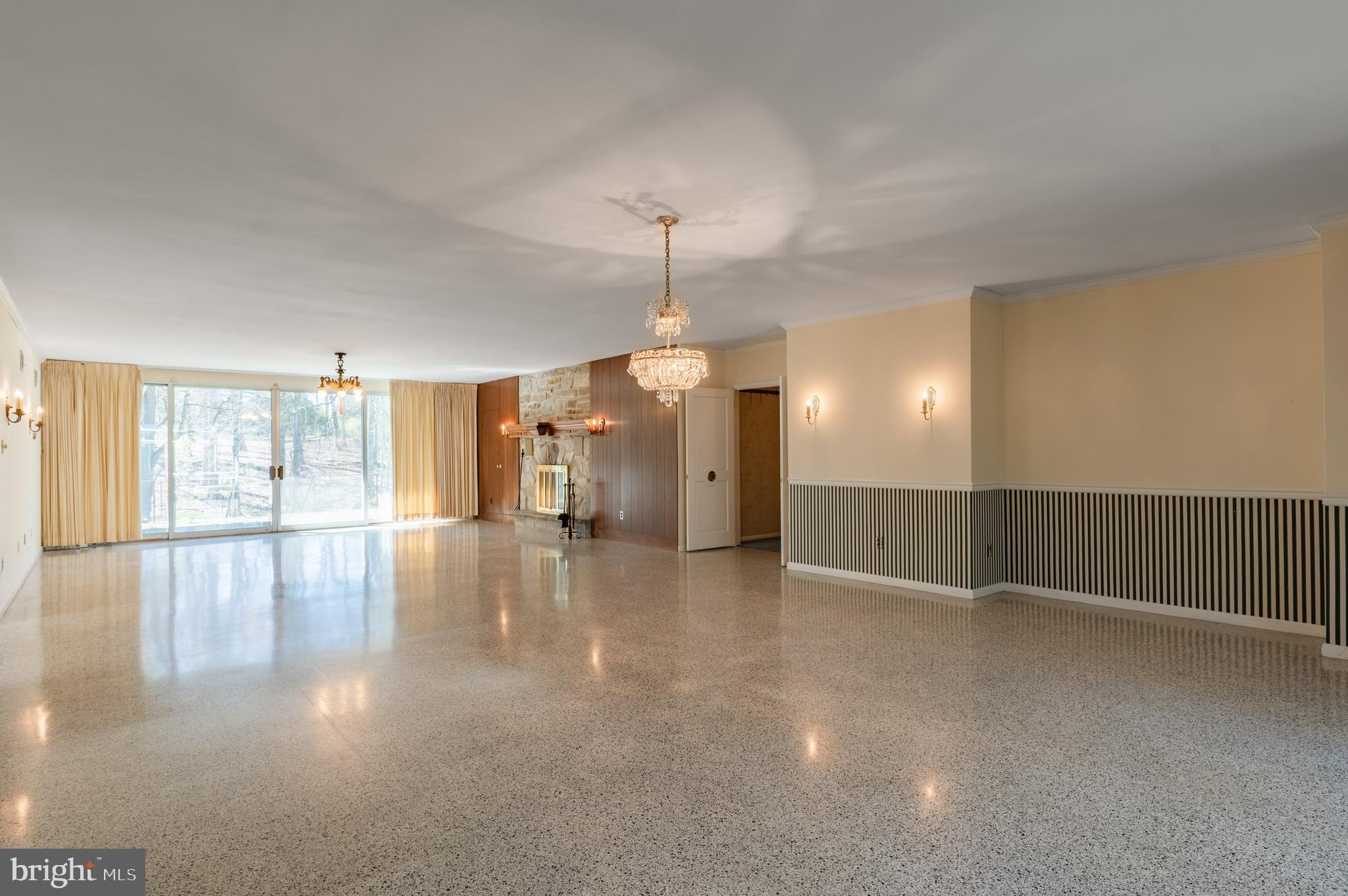 1211 East Butler Pike Ambler, PA 19002 - Photo 25 of 76 an empty room with wooden floor and windows