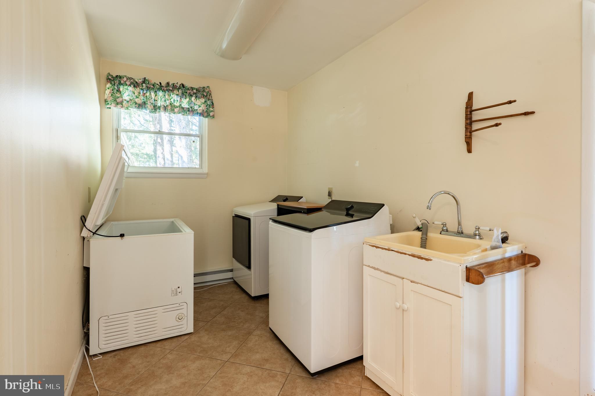 1211 East Butler Pike Ambler, PA 19002 - Photo 33 of 76 a utility room with dryer and washer