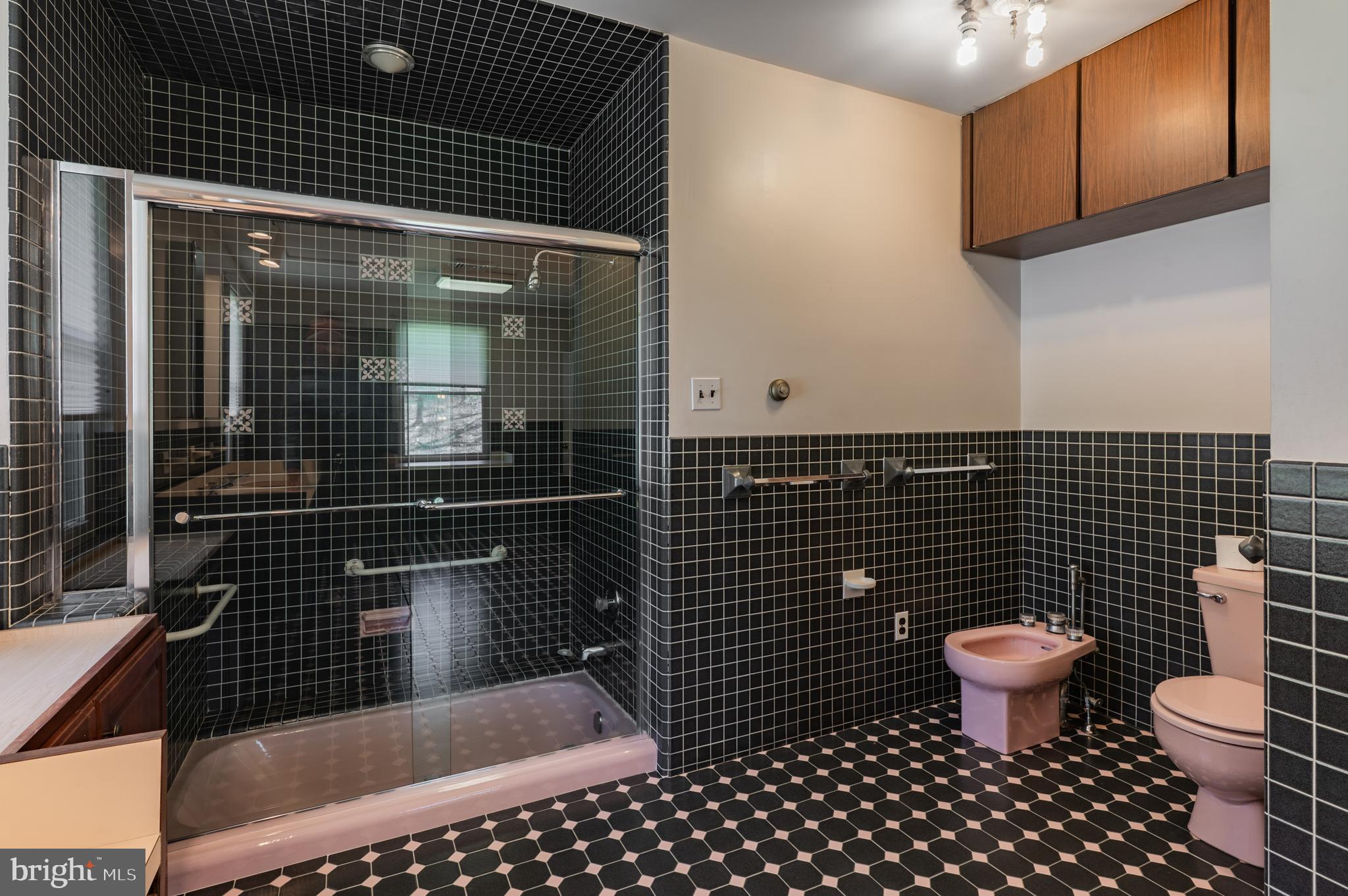 1211 East Butler Pike Ambler, PA 19002 - Photo 45 of 76 a bathroom with a toilet and a shower