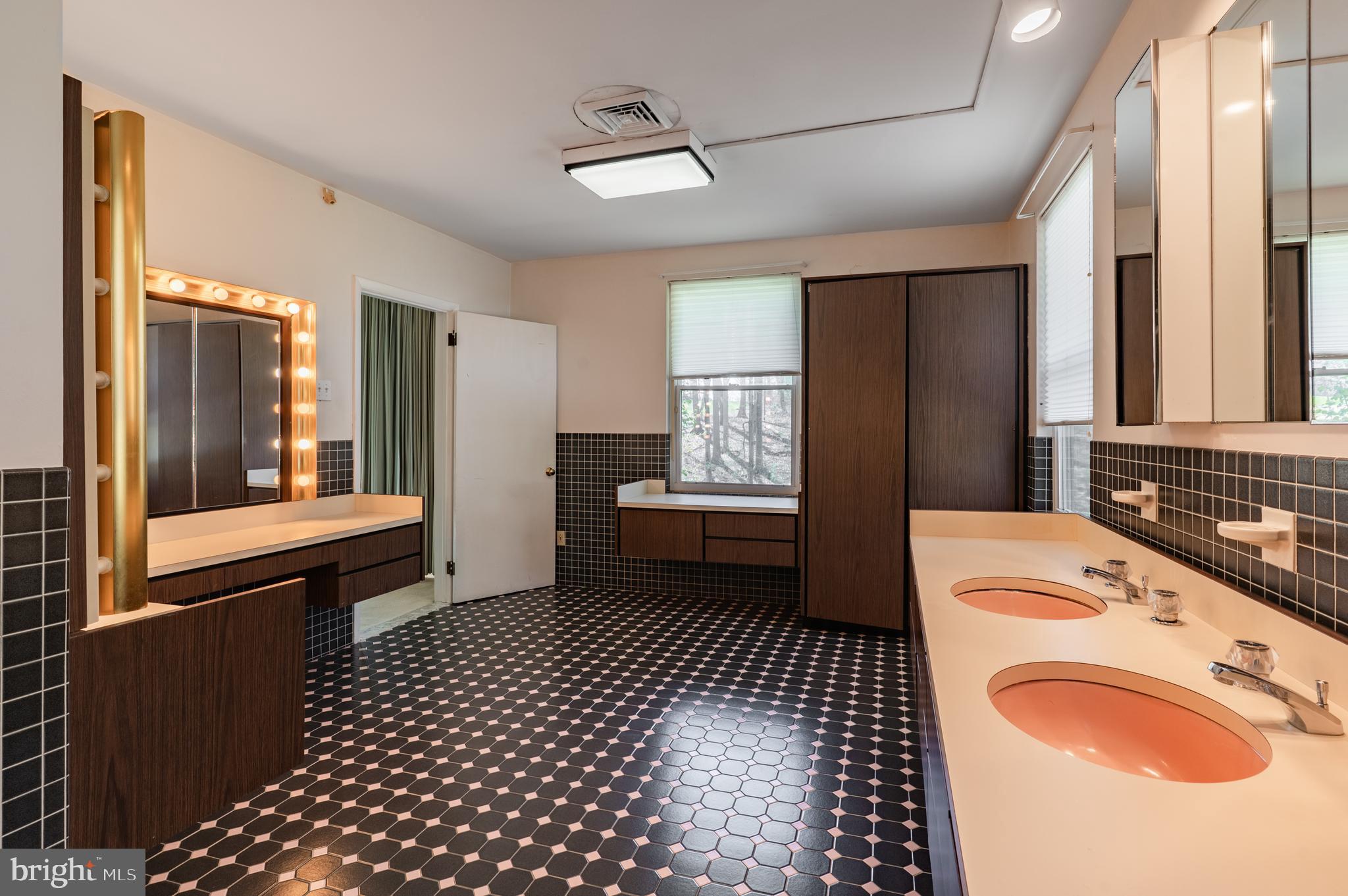 1211 East Butler Pike Ambler, PA 19002 - Photo 46 of 76 a bathroom with a sink toilet and mirror