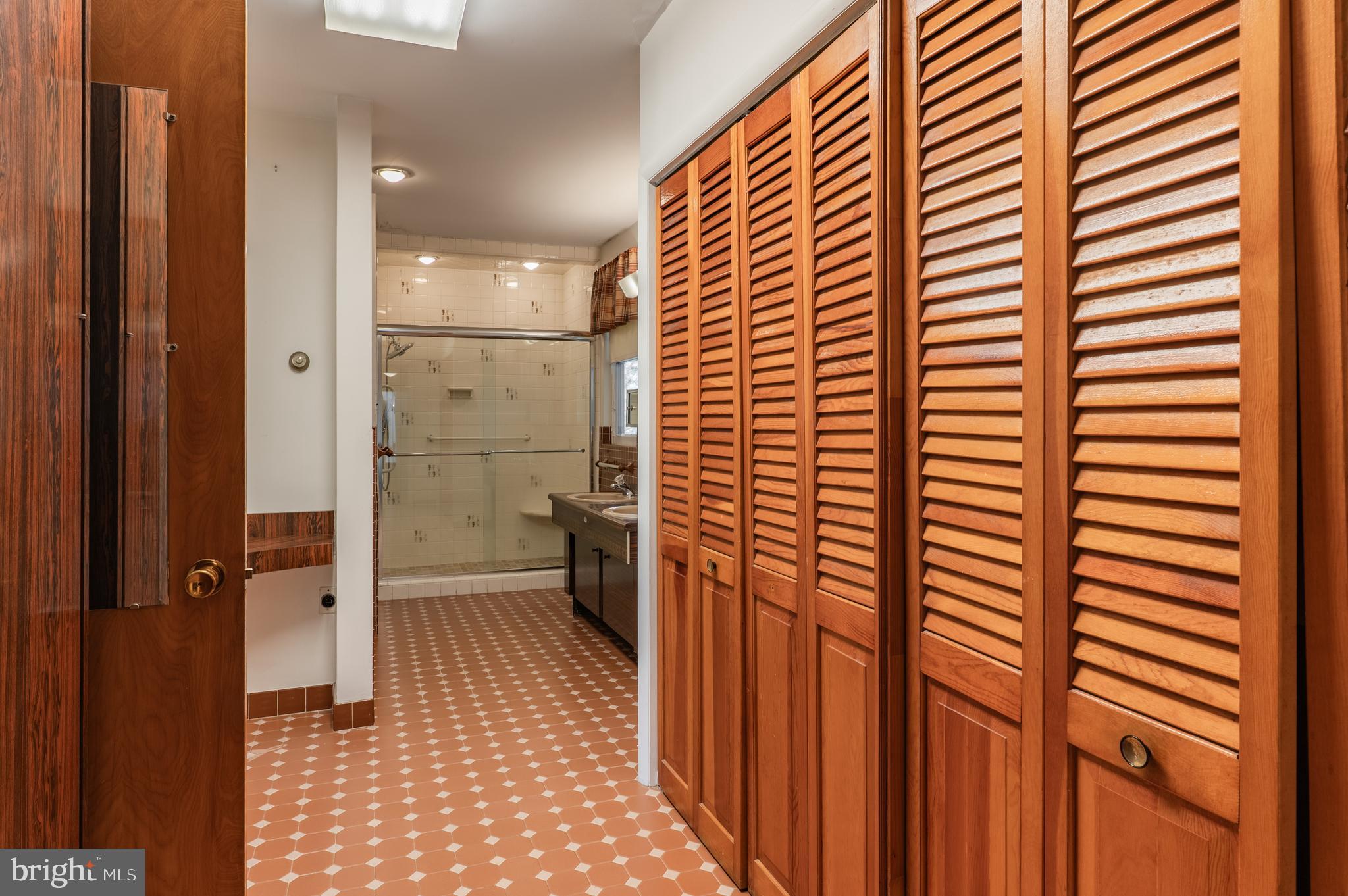 1211 East Butler Pike Ambler, PA 19002 - Photo 48 of 76 a bathroom with a shower and a sink