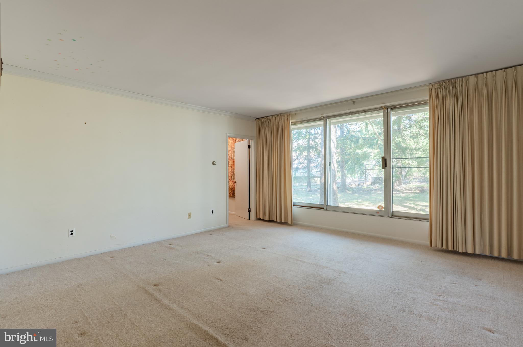 1211 East Butler Pike Ambler, PA 19002 - Photo 57 of 76 a view of an empty room with a window