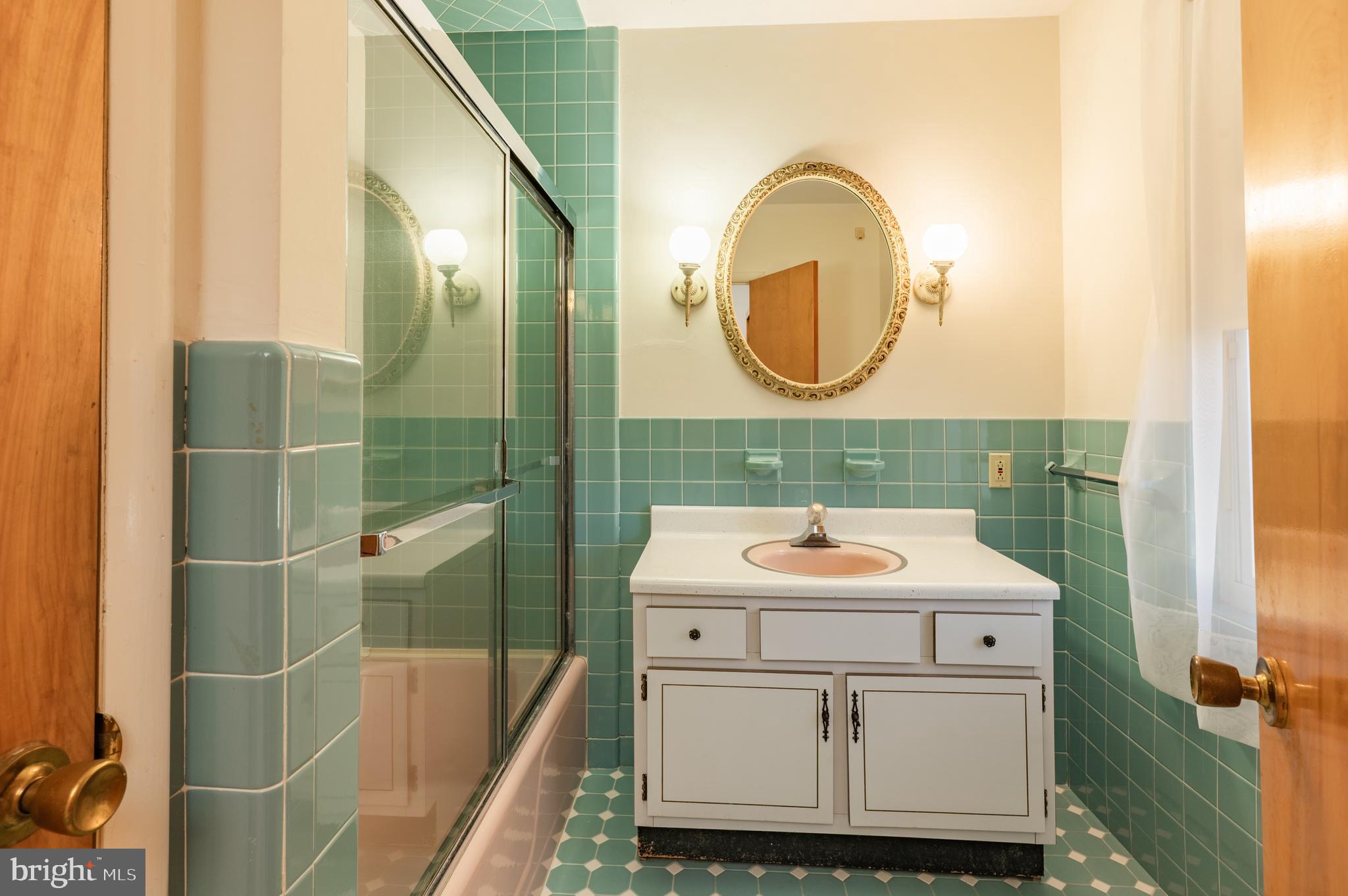 1211 East Butler Pike Ambler, PA 19002 - Photo 60 of 76 a bathroom with a sink mirror toilet and bathtub