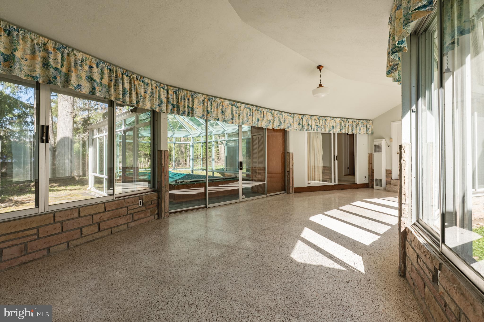 1211 East Butler Pike Ambler, PA 19002 - Photo 61 of 76 a view of an empty room and window
