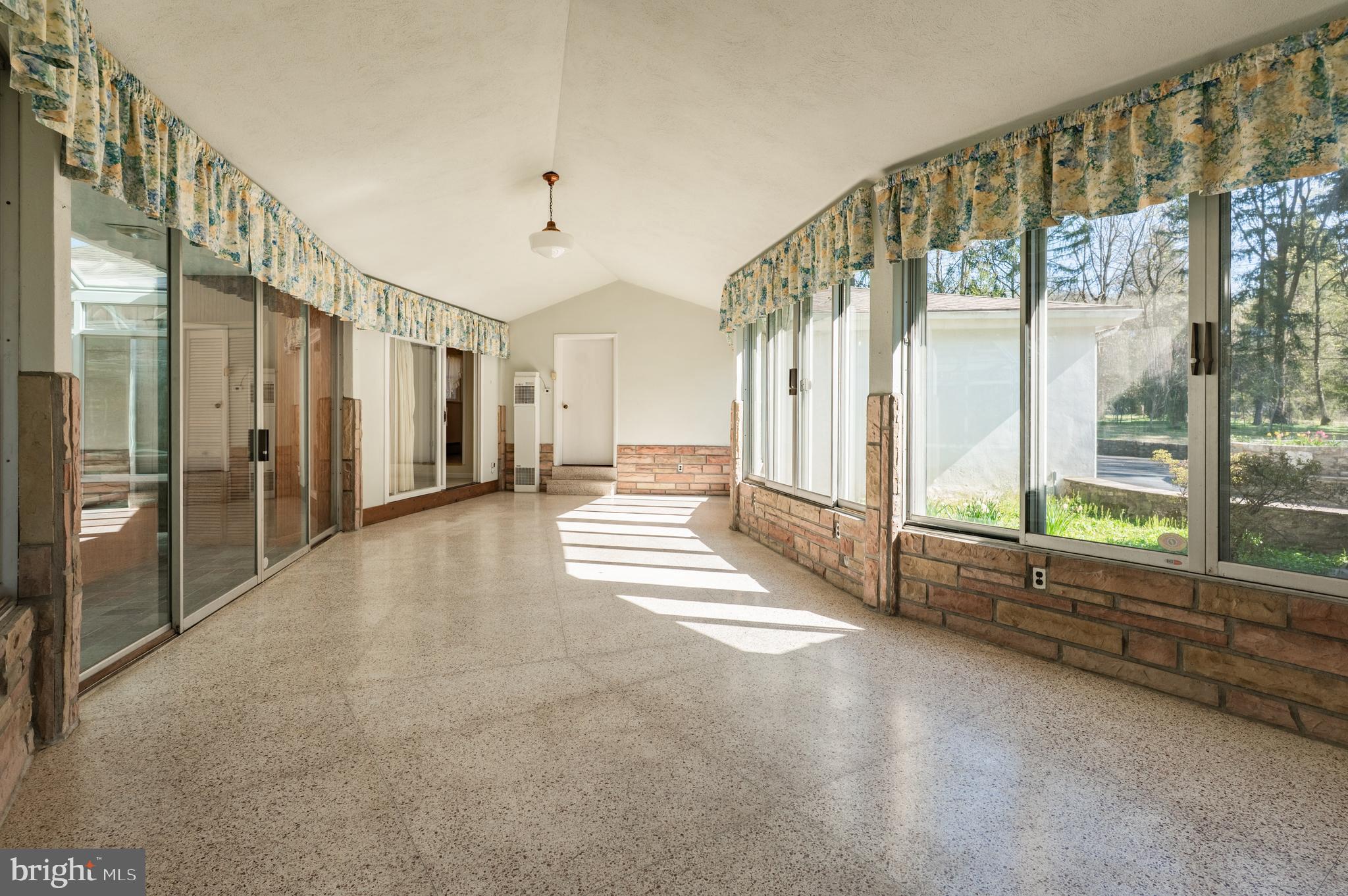 1211 East Butler Pike Ambler, PA 19002 - Photo 62 of 76 a view of an entryway with stairs and a large window