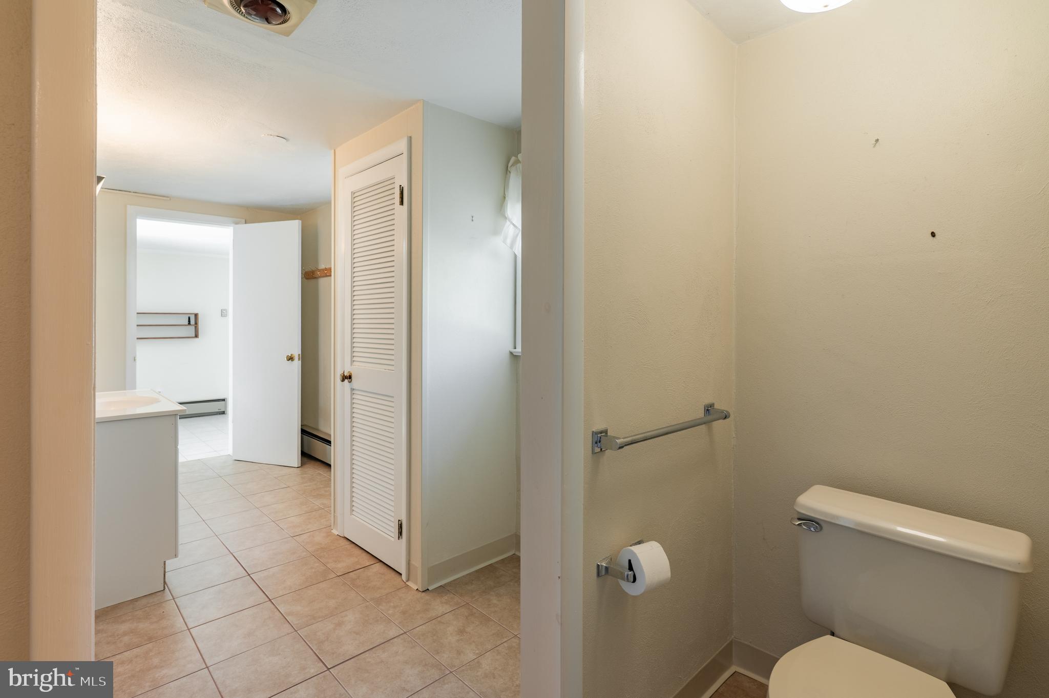 1211 East Butler Pike Ambler, PA 19002 - Photo 68 of 76 a bathroom with a toilet and a shower