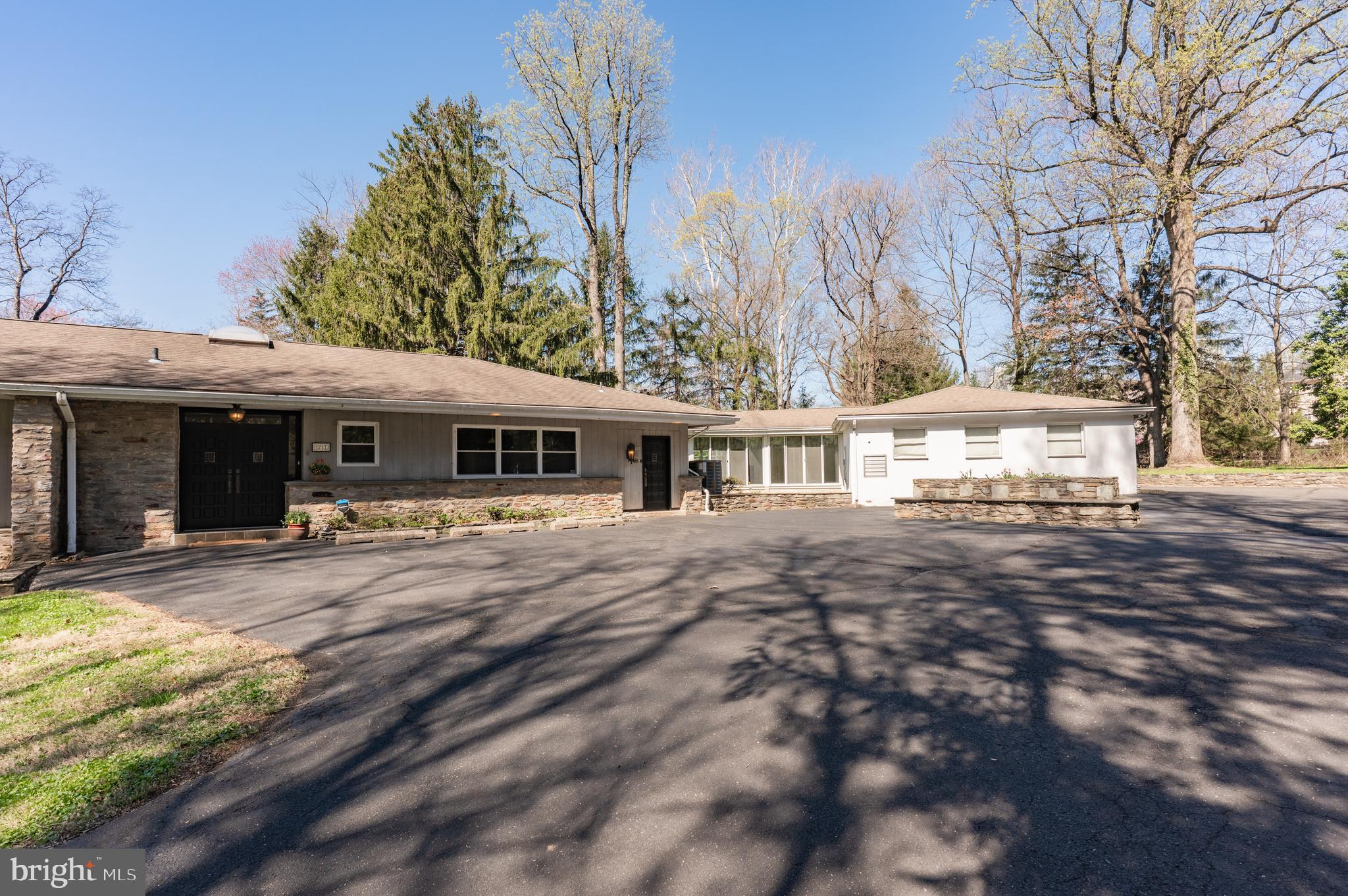 1211 East Butler Pike Ambler, PA 19002 - Photo 70 of 76 a front view of a house with a yard