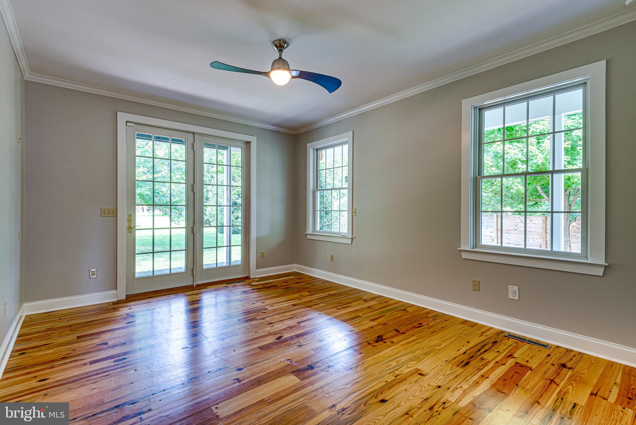 1441 Bay Head Road Annapolis, MD 21409 - Photo 17 of 54 Main floor primary bedroom with access to porch