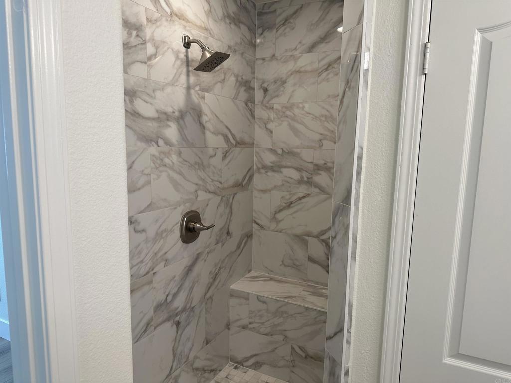 4026 Aidan Circle Carlsbad, CA 92008 - Photo 10 of 26 a bathroom with a shower