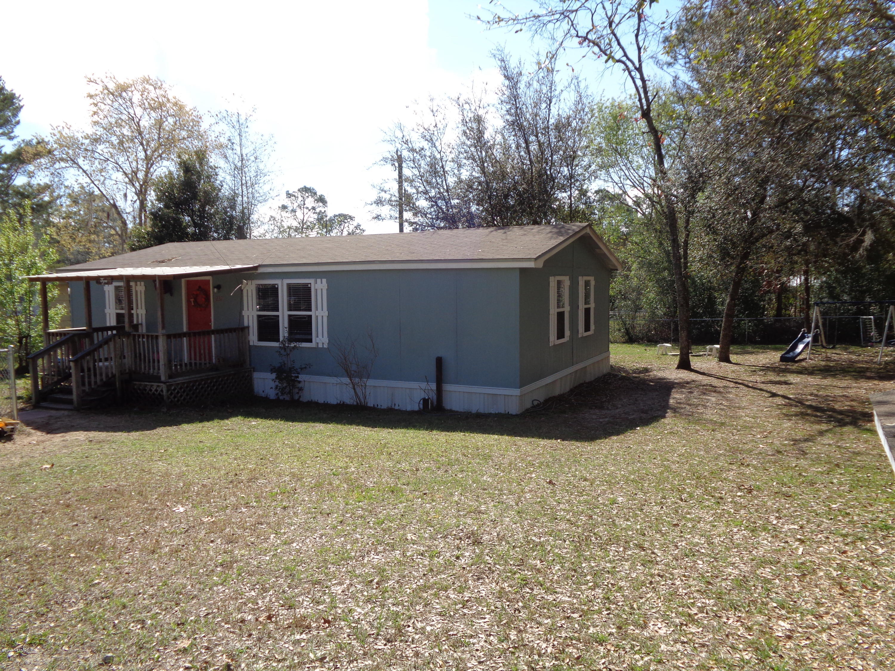 237 5th Way Interlachen, FL 32148 - Photo 16 of 23 side yard