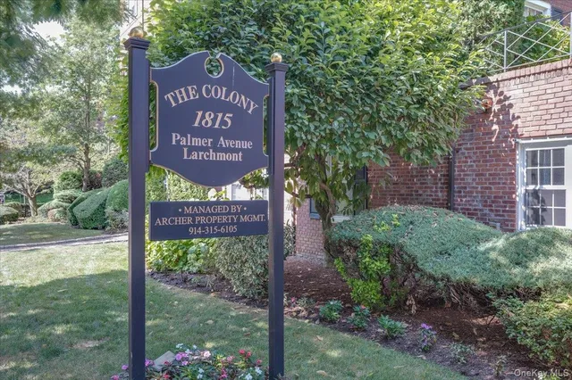 a sign on the side of the road