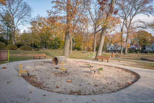 a view of a swimming pool with a lounge chair